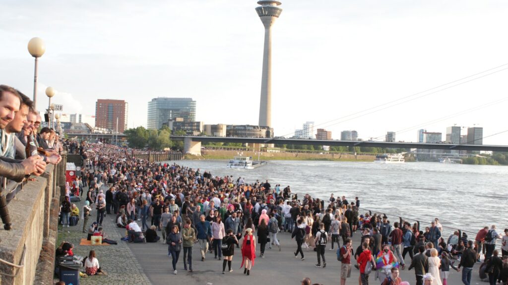 crowd of people near body of water
